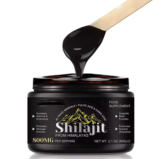 Shilajit pure resin in a jar with spoon, natural energy supplement from Himalayas, rich in fulvic acid and minerals.