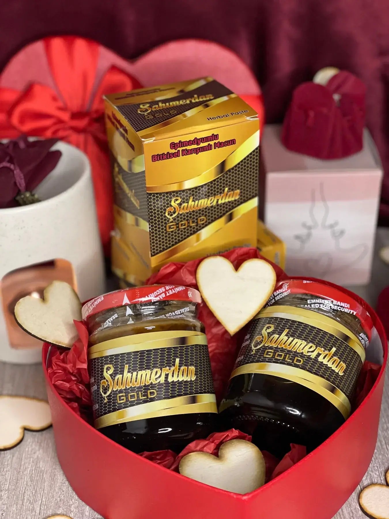 Sahmerdan Gold herbal jars displayed in a heart-shaped box, perfect for natural wellness and gifting.